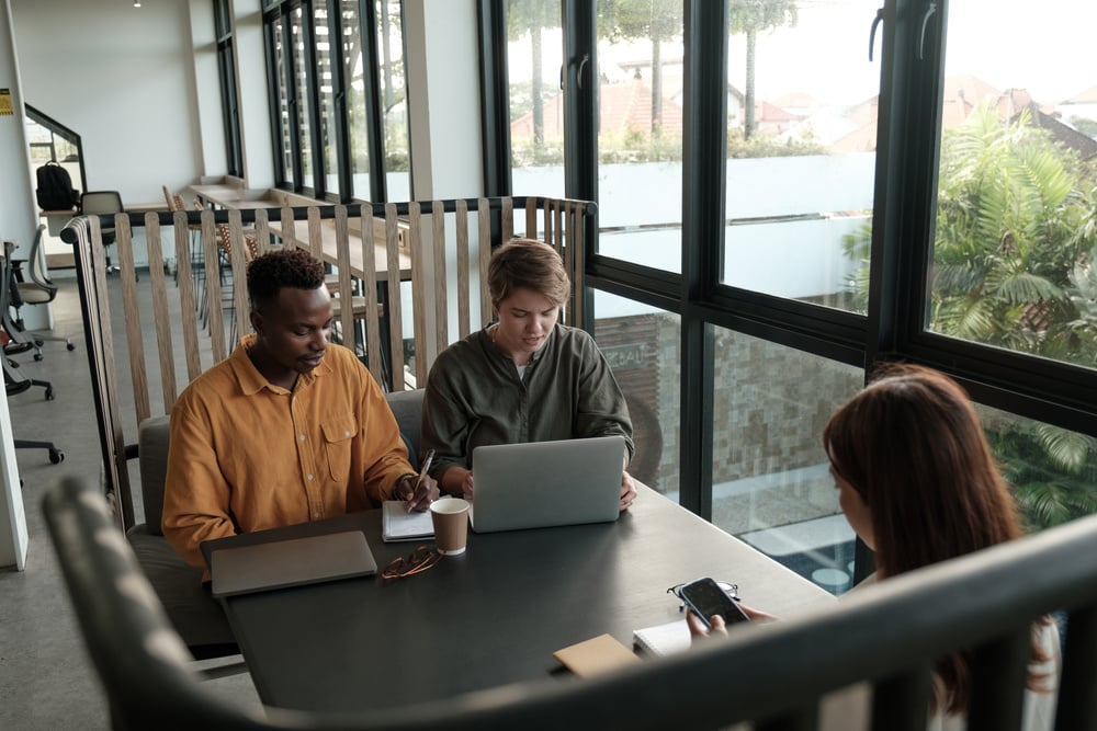 HR Office Environment Team Working in a Booth Table